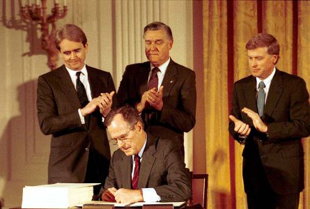 How Many US Presidents Were Left Handed? 3 President George H. W. Bush signs the Clean Air Act Amendments